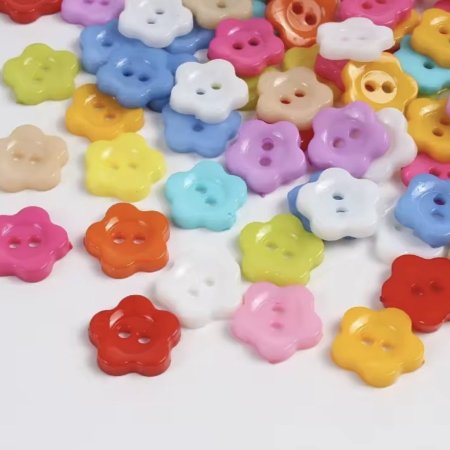 زر ملابس أطفال ملون-وردة